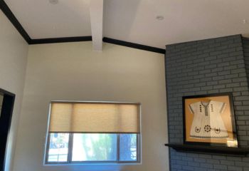 Living room in Los Gatos featuring newly installed sheer roller shades, allowing natural light while providing privacy.